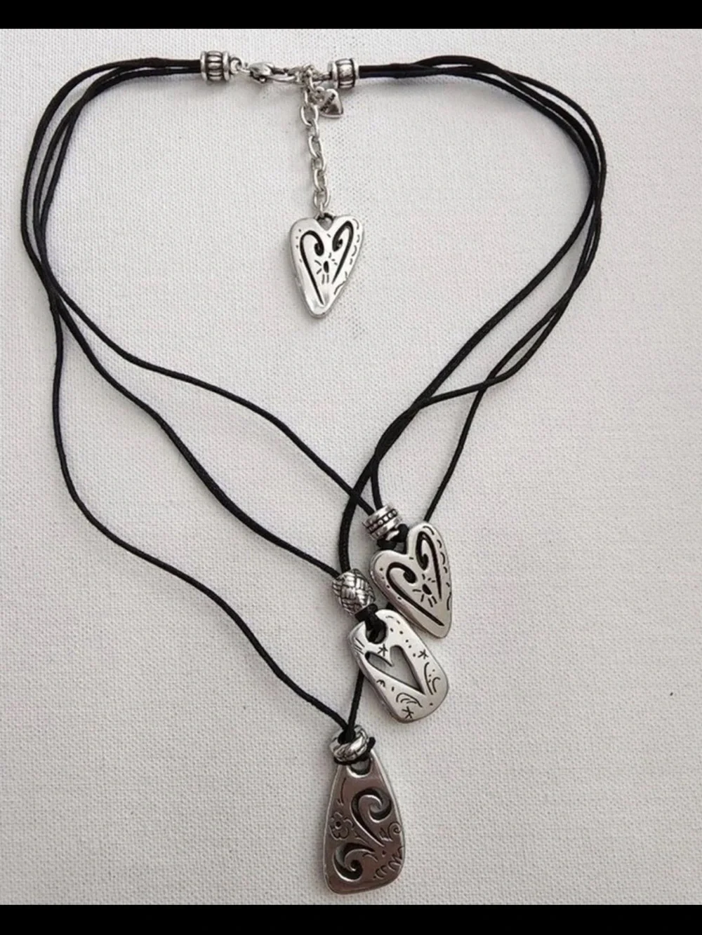 Brighton Brazilian Black multi charm triple strand leather cord necklace